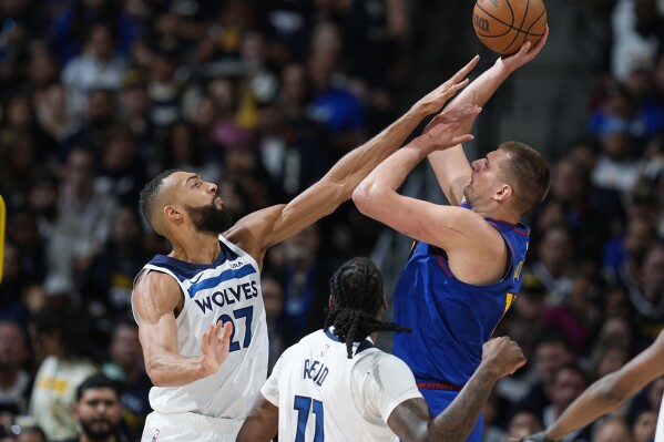 Timberwolves center Rudy Gobert misses Game 2 in Denver after flying home for birth of his son