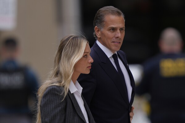 Hunter Biden arrives in federal court with his wife, Melissa Cohen Biden, Tuesday, June 11, 2024, in Wilmington, Del.  (AP Photo/Matt Rourke)