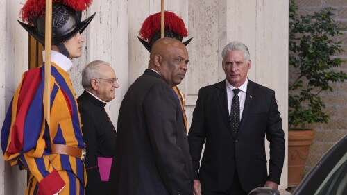 Cuban President Miguel Díaz-Canel, right, arrives to meet with Pope Francis at The Vatican, Tuesday, June 20, 2023. (AP Photo/Domenico Stinellis)