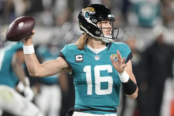 Jags QB Lawrence makes playoff history with 4 1st-half picks