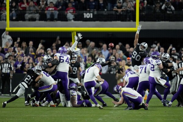 Minnesota Vikings place kicker Greg Joseph (1) kicks the game-winning field goal against the Las Vegas Raiders during the second half of an NFL football game, Sunday, Dec. 10, 2023, in Las Vegas. (AP Photo/John Locher)