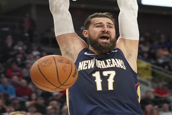 New Orleans Pelicans' Jonas Valanciunas looks on after dunking against the Utah Jazz in the first half of a preseason NBA basketball game Monday, Oct. 11, 2021, in Salt Lake City. (AP Photo/Rick Bowmer)