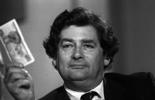 This Dec. 5, 1985 file photo shows Nigel Lawson in London. Lawson, the tax-cutting UK Treasury chief under the late Margaret Thatcher and a lion of Conservative politics in the late 20th century has died. He was 91. (PA via AP)/PA via AP)
