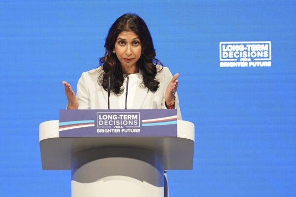 Britain's Home Secretary Suella Braverman delivers her keynote speech during the Conservative Party annual conference at the Manchester Central convention complex, Manchester, England, Tuesday Oct. 3, 2023. (Stefan Rousseau/PA via AP)