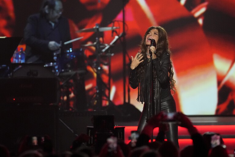 FILE - Shania Twain performs during MusiCares Person of the Year honoring Jon Bon Jovi on Friday, Feb. 2, 2024, in Los Angeles. Dua Lipa, Sza and Shania Twain lead female charge at this year's Glastonbury festival in June. (AP Photo/Chris Pizzello, File)