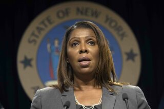 FILE - In this June 11, 2019, file photo, New York Attorney General Letitia James speaks during a news conference, in New York. New York state, New York City, Connecticut and Vermont have filed a new legal challenge to new Trump administration rules blocking green cards for many immigrants who use public assistance including Medicaid, food stamps and housing vouchers. James, a Democrat, says the change is a “clear violation” of American values and 100 years of case law. (AP Photo/Mary Altaffer, File)