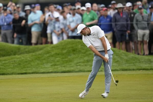 Scottie Scheffler hits from the fairway on the sixth hole during the second round of the PGA Championship golf tournament at Oak Hill Country Club on Friday, May 19, 2023, in Pittsford, N.Y. (AP Photo/Abbie Parr)