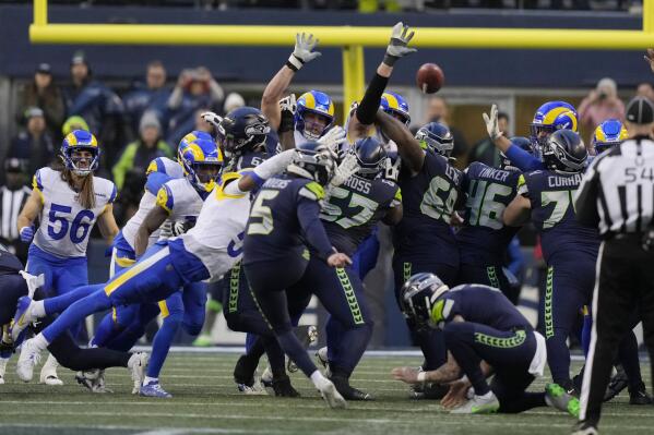 Seahawks top Rams 19-16 in OT, in playoffs after Lions win