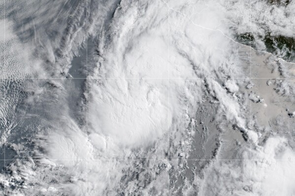This satellite image provided by the National Oceanic and Atmospheric Administration (NOAA) shows Tropical Storm Alvin, Thursday, May 29, 2025. (NOAA via AP)