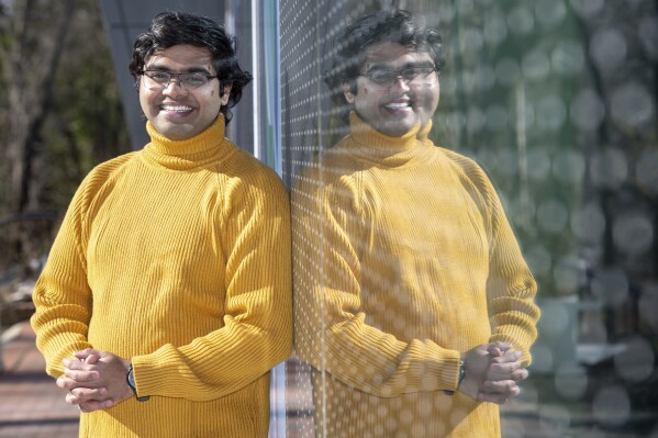 Pranay Karkale, a first-year graduate student at Johns Hopkins University from Nashik, India, stands at the university's campus in Baltimore on Sunday, Feb. 18, 2024. Karkale is working toward his Master of Science in engineering management. (AP Photo/Steve Ruark)