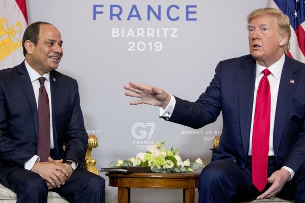President Donald Trump, right, speaks during a bilateral meeting with Egyptian President Abdel Fattah al-Sissi, left, at the G-7 summit in Biarritz, France, Monday, Aug. 26, 2019. (AP Photo/Andrew Harnik)