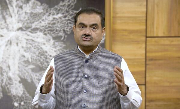 This grab from video released by Adani Enterprises Ltd. on Thursday, Feb.2, 2023 shows Indian billionaire Gautam Adani addressing investors from an unknown location. Losses for the troubled Adani Group, India's second-largest conglomerate, deepened on Friday as shares in its flagship company tumbled another 25%, extending over a week of declines that have wiped out tens of billions of dollars in market value. (Adani Enterprises Ltd. via AP)