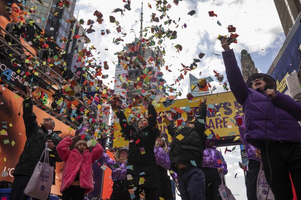 Confetti is released during a confetti test ahead of New Year's Eve in Times Square, Friday, Dec. 29, 2023, in New York. (AP Photo/Yuki Iwamura)