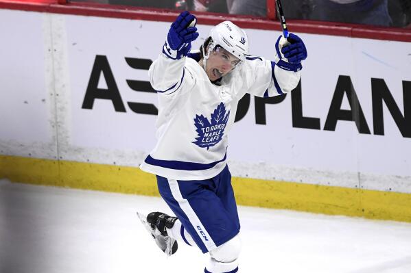 Toronto Maple Leafs right wing Mitchell Marner (16) celebrates his goal against the Ottawa Senators to tie an NHL gockey game during third-period  action in Ottawa, Ontario, Saturday, April 16, 2022. (Justin Tang/The Canadian Press via AP)