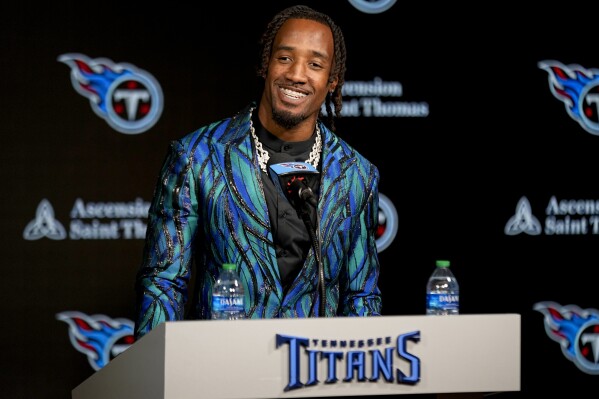Tennessee Titans cornerback L'Jarius Sneed responds to questions from reporters at the NFL football team's training facility Tuesday, April 2, 2024, in Nashville, Tenn. Sneed was acquired by the Titans through a trade with the Kansas City Chiefs. (AP Photo/George Walker IV)