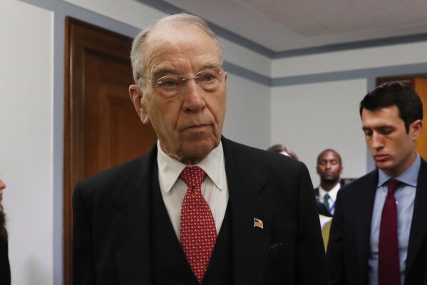 
              Sen. Chuck Grassley, R-Iowa, chairman of the Senate Finance Committee walks to chair a hearing on drug prices, Tuesday, Feb. 26, 2019 on Capitol Hill in Washington. (AP Photo/Jacquelyn Martin)
            