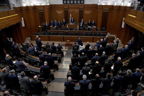 Lebanese lawmakers gather to elect a president at the parliament building in Beirut, Lebanon, Thursday, Jan. 19, 2023. The Lebanese pound's value Thursday hit an all-time low, now trading at 50,000 to the U.S. dollar, as the country's deeply-divided parliament failed to elect a president for an 11th time. (AP Photo/Bilal Hussein)
