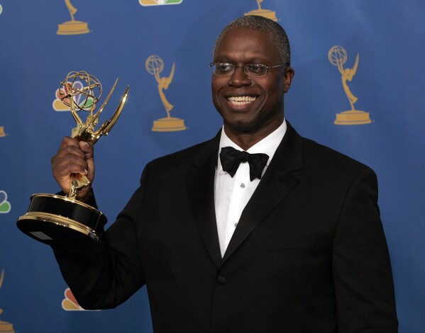 FILE - Andre Braugher holds the award for outstanding lead actor in a miniseries or a movie for his work on "Thief" at the 58th annual Primetime Emmy Awards, Aug. 27, 2006, in Los Angeles. Braugher, the Emmy-winning actor best known for his roles on the series “Homicide: Life on The Street” and “Brooklyn 99,” died Monday, Dec. 11, 2023, at age 61. (AP Photo/Reed Saxon, File)