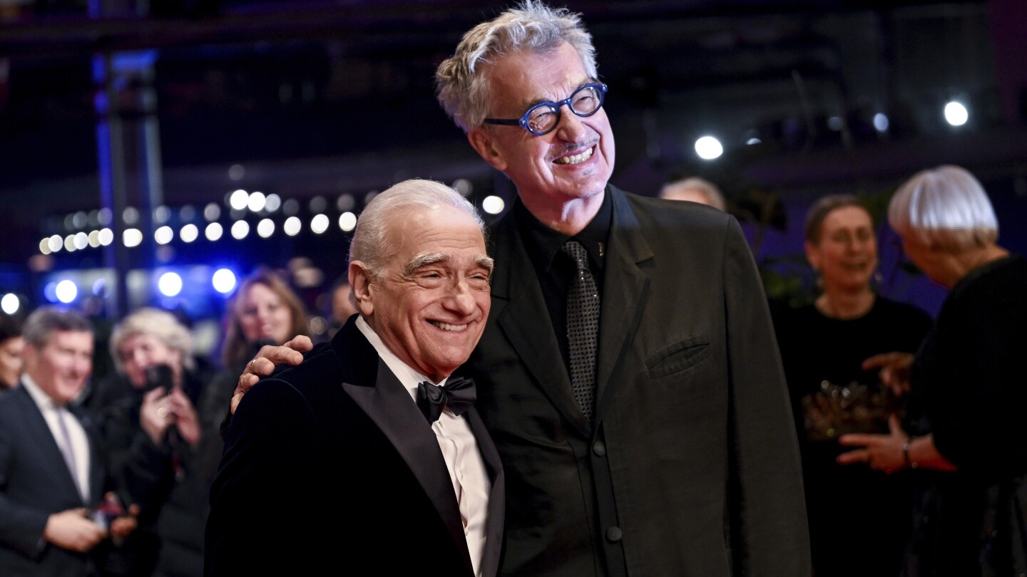 U.S. director Martin Scorsese, left, and Wim Wenders attend the presentation of the Honorary Golden Bear at this year's Berlinale, in Berlin, Tuesday, Feb. 20, 2024. Scorsese received the award for his life's work. The 74th Berlin International Film Festival runs through Feb. 25. (Britta Pedersen/dpa via AP)