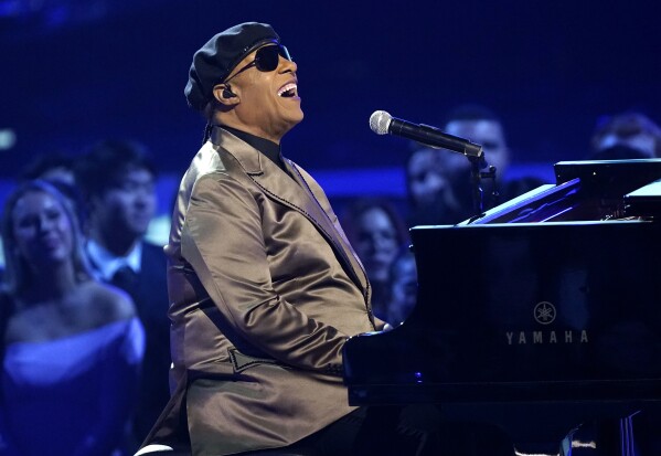 FILE - Stevie Wonder performs a medley in tribute to Icon award winner Lionel Richie at the American Music Awards on Sunday, Nov. 20, 2022, at the Microsoft Theater in Los Angeles. Apple Music announced on Wednesday, May 22, 2024, their 10 greatest albums of all time and Wonder's 1976 “Songs in the Key of Life” came in sixth on the list. (AP Photo/Chris Pizzello, File)