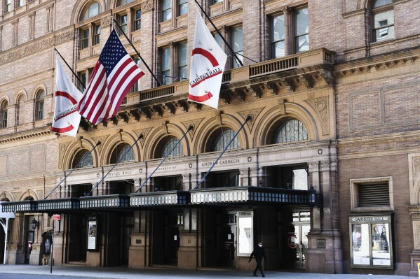 FILE - The exterior of Carnegie Hall appears in New York on May 12, 2020. (Photo by Evan Agostini/Invision/AP, File)