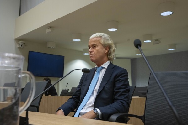 Firebrand anti-Islam lawmaker Geert Wilders listened as the court delived it's verdict against a former Pakistan cricketer accused of incitement to kill, at the high security court building near Schiphol airport, Monday, Sept. 11, 2023. The suspect, identified by Wilders as Khalid Latif, is accused of offering a bounty of some 21,000 euros ($23,000) to anybody who killed Wilders. Prosecutors haven't named Latif. However, in a statement they say a video posted online in 2018 shows a famous Pakistan cricketer offering a bounty for killing Wilders. (AP Photo/Peter Dejong)