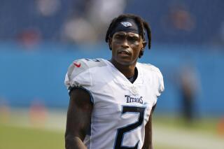 FILE — Tennessee Titans wide receiver Julio Jones leaves the field after an NFL football game against the Arizona Cardinals Sunday, Sept. 12, 2021, in Nashville, Tenn. A person familiar with the move says the Titans will be releasing Jones, a seven-time Pro Bowl wide receiver, in a move to clear salary cap space. (AP Photo/Wade Payne, File)