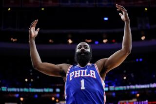 FILE - Philadelphia 76ers' James Harden gestures during the first half of Game 3 of the team's NBA basketball second-round playoff series against the Miami Heat, May 6, 2022, in Philadelphia. A person familiar with the situation said Harden chose not to exercise his $47.4 million option for next season and will become a free agent — but with no designs on leaving Philadelphia. Harden made the decision to allow the 76ers the flexibility they need to sign other players this summer, said the person who spoke to The Associated Press on condition of anonymity because neither side confirmed those plans publicly. (AP Photo/Matt Slocum, File)