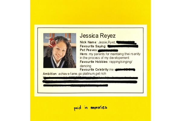 This album cover image released by Island Records shows "Paid in Memories" by Jessica Reyez. (Island Records via AP)
