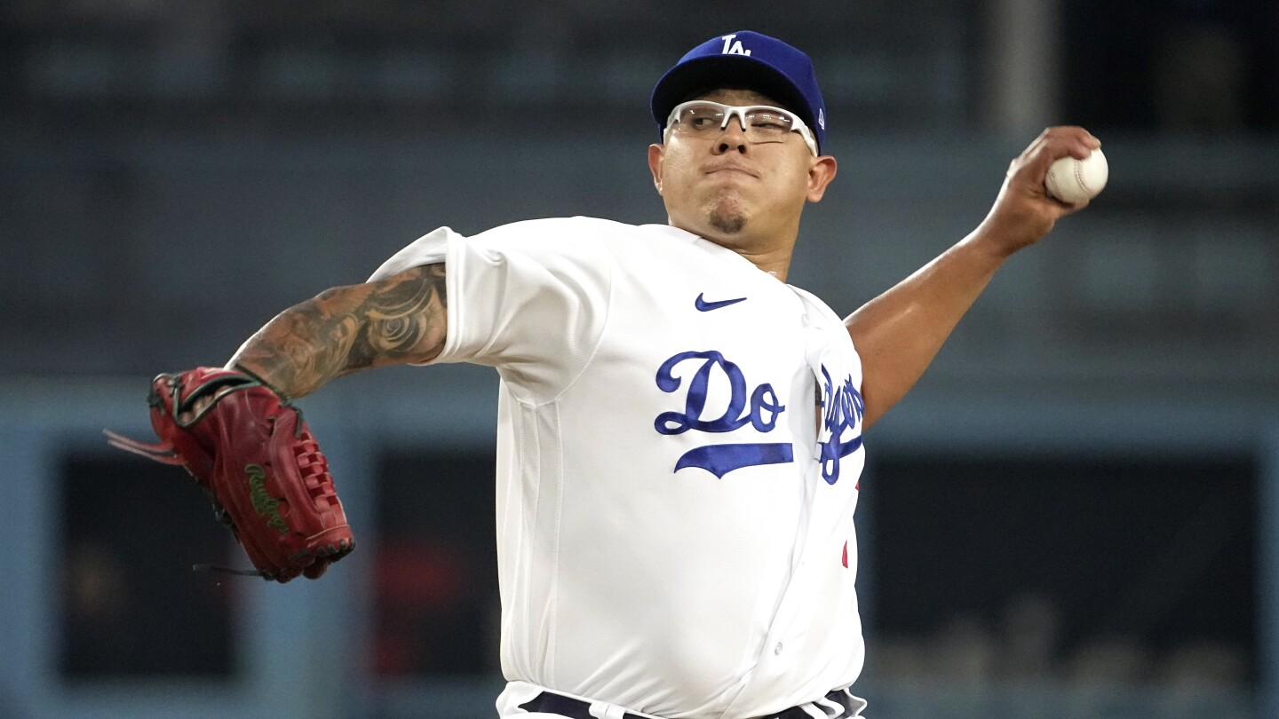 Pitcher Julio Urías suspended through the All-Star break by MLB under domestic violence policy