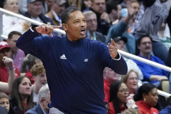 Chattanooga coach Lamont Paris gestures after the ball went out of bounds on a bad pass against Illinois during the second half of a college basketball game in the first round of the NCAA men's tournament Friday, March 18, 2022, in Pittsburgh. (AP Photo/Keith Srakocic)