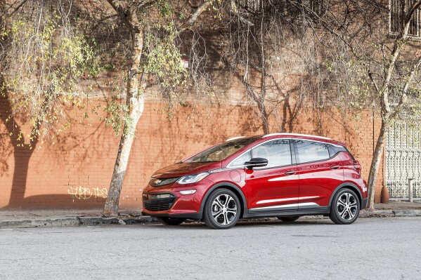 This photo provided by Edmunds shows a 2017 Chevrolet Bolt EV. There are upsides to purchasing a used electric vehicle such as fuel savings and taking advantage of an available federal tax credit of up to $4,000. (Courtesy of Edmunds via AP)