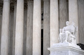 The Guardian of Law scuplture is seen at the west entrance of the Supreme Court on Thursday, Feb. 22, 2024, in Washington. (AP Photo/Mark Schiefelbein)