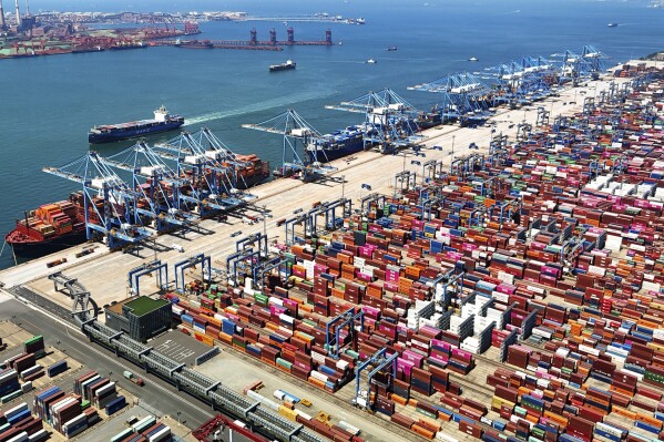 FILE - An aerial view of a container port is seen in Qingdao in east China's Shandong province June 6, 2024. China’s exports beat forecasts in June, customs data showed Friday, July 12, while imports grew less than expected. (Chinatopix via AP, File)