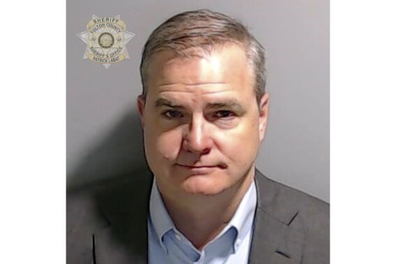 This booking photo provided by the Fulton County Sheriff's Office shows Shawn Still on Friday, Aug. 25, 2023, in Atlanta, after he surrendered and was booked. Still is charged alongside former President Donald Trump and 17 others, who are accused by Fulton County District Attorney Fani Willis of scheming to subvert the will of Georgia voters to keep the Republican president in the White House after he lost to Democrat Joe Biden. (Fulton County Sheriff's Office via AP)