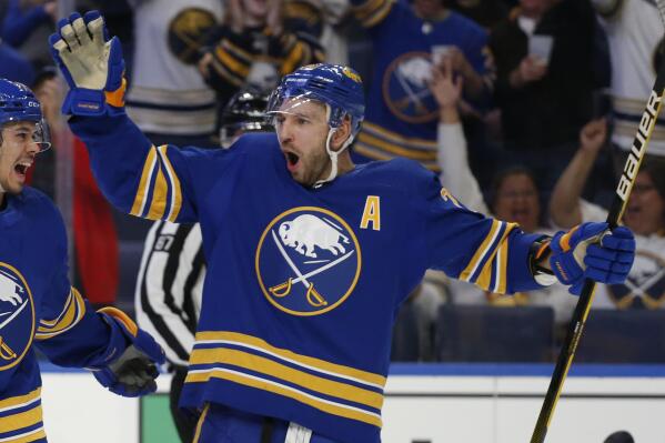Buffalo Sabres forward Zemgus Girgensons celebrates his goal during the first period of the team's NHL hockey game against the Montreal Canadiens, Thursday, Oct. 14, 2021, in Buffalo, N.Y. (AP Photo/Jeffrey T. Barnes)