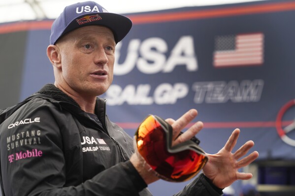 FILE - Team USA driver Jimmy Spithill speaks during an interview at the Los Angeles Sail Grand Prix, on Friday, July 21, 2023, at the Port of the Los Angeles. Star skipper Jimmy Spithill said he plans to start a new Italian team following his departure from the United States SailGP team. Spithill said he couldn't disclose any specifics about the USA team other than a new group is bringing in its own CEO and driver, the roles Spithill has held since taking over the U.S. team in the second season of tech tycoon Larry Ellison's global league. (AP Photo/Damian Dovarganes, File)