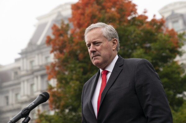 FILE - White House chief of staff Mark Meadows speaks with reporters at the White House, Wednesday, Oct. 21, 2020, in Washington. federal appeals court on Monday, Dec. 18, 2023, ruled that Trump White House chief of staff Mark Meadows cannot move charges related to efforts to overturn the 2020 election in Georgia to federal court. (AP Photo/Alex Brandon, File)
