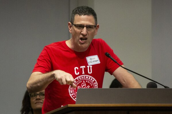 FILE - In this Sept. 24, 2019 file photo Chicago Teachers Union President Jesse Sharkey speaks at the CTU headquarters, in Chicago. A Chicago teachers strike could be less than a week away if progress if there isn't a last-minute deal between the union and nation's third-largest school district. The Chicago Teachers Union has overwhelmingly voted to authorize a strike as contract talks continue over issues including pay and benefits, class size and staffing shortages. Negotiations resume Wednesday, Oct. 2, 2019 as the union's delegates meet to finalize a strike date. The earliest a walkout could take place is Monday. (Ashlee Rezin Garcia/Chicago Sun-Times via AP, File)