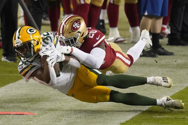 Aaron Rodgers leads Packers past undermanned 49ers, 34-17