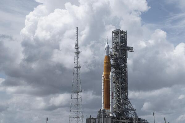 In this photo provided by NASA, NASA's Space Launch System (SLS) rocket with the Orion spacecraft aboard is seen atop the mobile launcher at Launch Pad 39B, Tuesday, Aug. 30, 2022, at NASA's Kennedy Space Center in Cape Canaveral, Fla.. NASA's Artemis I flight test is the first integrated test of the agency's deep space exploration systems: (Joel Kowsky/NASA via AP)