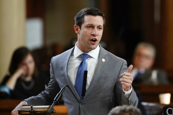 
              FILE - In this March 28, 2018, file photo, Sen. Adam Morfeld speaks at the Legislature in Lincoln, Neb. Nebraska voters may get the chance decide a medical marijuana ballot measure in 2020 if lawmakers don't approve one in the session that starts next month. State Sens. Anna Wishart and Morfeld, both of Lincoln, announced the formation Thursday, Dec. 13, 2018, of Nebraskans for Sensible Marijuana Laws, a committee primed to launch a signature-gathering campaign. (AP Photo/Nati Harnik, File)
            