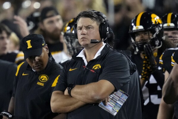 FILE - Iowa's Brian Ferentz watches from the sideline during the second half of an NCAA college football game against Michigan State, Saturday, Sept. 30, 2023, in Iowa City, Iowa. Ferentz will be out as Iowa's offensive coordinator at the end of the season, interim athletic director Beth Goetz announced Monday, Oct. 30. (AP Photo/Charlie Neibergall, File)