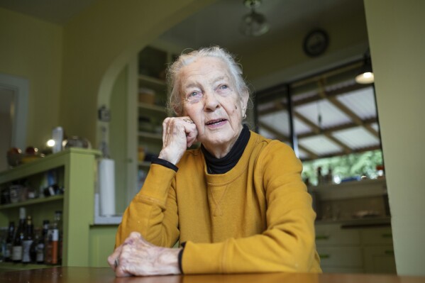 Karin Engstrom, 82, poses for photos at home, Wednesday, Sept. 27, 2023, in Seattle. Engstrom recently had student loans forgiven. She's one of 804,000 borrowers who will have a total of $39 billion forgiven under a one-time adjustment granted by the Biden administration. (APPhoto/Stephen Brashear)