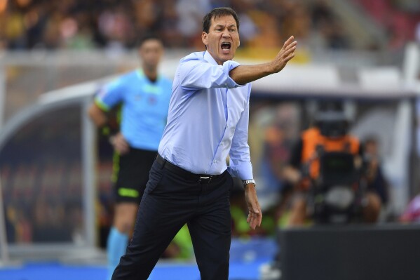 Napoli coach Rudi Garcia gives instructions during the Serie A soccer match between Lecce and Napoli at the Via del Mare stadium in Lecce, Italy, Saturday, Sept. 30, 2023. (Giovanni Evangelista/LaPresse via AP)