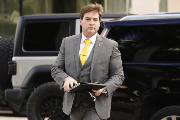 Dr. Craig Wright arrives at the Federal Courthouse, Tuesday, Nov. 16, 2021, in Miami. Wright is in a civil trial with Ira Kleiman. Kleiman claims that his deceased brother David and Wright were co-creators of Bitcoin. (AP Photo/Marta Lavandier)