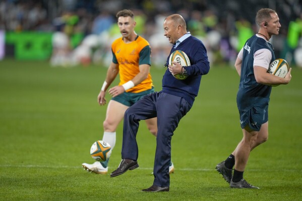 Australian coach Eddie Jones kicks the ball as he warms -up his players ahead of the Rugby Championship test match between Australia and Argentina in Sydney, Australia, Saturday, July 15, 2023. (AP Photo/Rick Rycroft)
