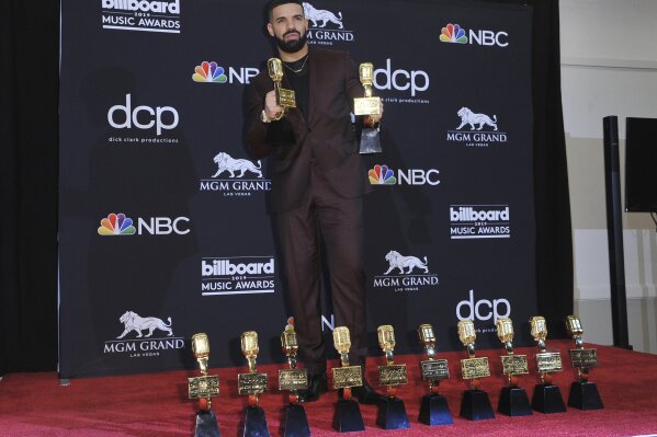 
              Drake poses in the press room with his awards at the Billboard Music Awards on Wednesday, May 1, 2019, at the MGM Grand Garden Arena in Las Vegas. Drake won for top artist, top male ...