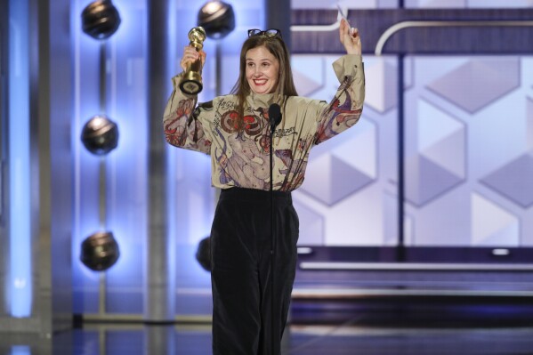 This image released by CBS shows filmmaker Justine Triet from "Anatomy of a Fall" during the 81st Annual Golden Globe Awards in Beverly Hills, Calif., on Sunday, Jan. 7, 2024. (Sonja Flemming/CBS via AP)