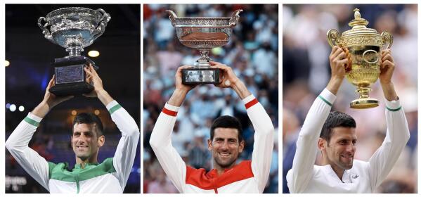 FILE- In this combo of 2021 file photos, Serbia's Novak Djokovic poses with the trophy after winning a Grand Slam tennis tournament, from left, Australian Open, French Open and Wimbledon. Djokovic is 26-0 in Grand Slam matches in 2021, moving him two victories away from being the first man to win all four major tennis championships in one season since Rod Laver in 1969. (AP Photo/File)